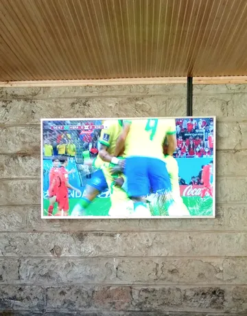 Neatly mounted television and cable installation in Ruaka